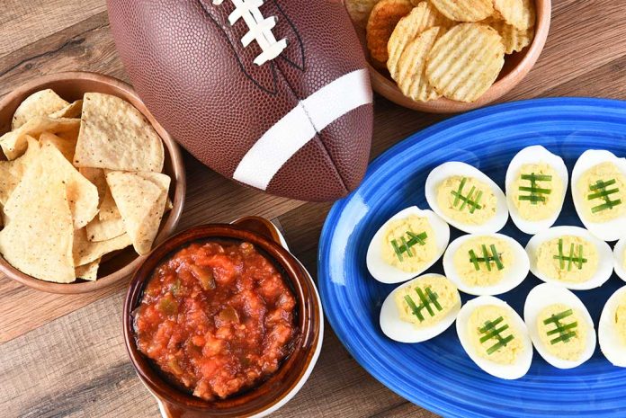 High,Angle,View,Of,Snacks,For,Watching,A,Football,Game.